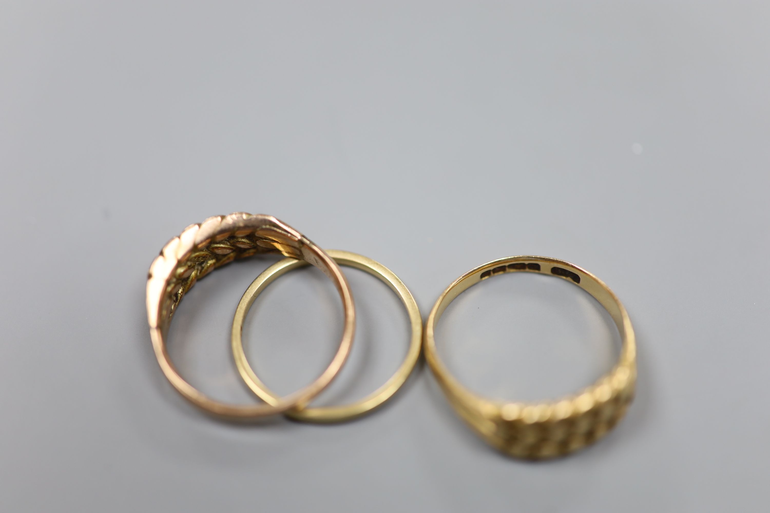 Three assorted 9ct gold rings